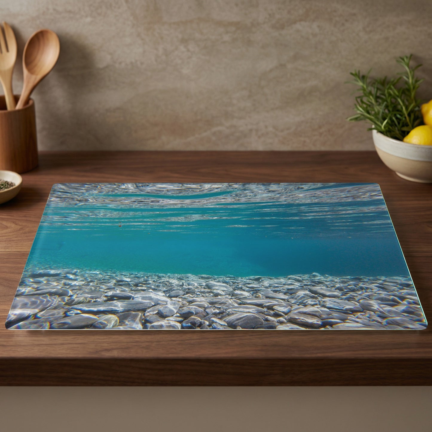 Underwater view of a clear lake with pebbles and a wooden countertop.