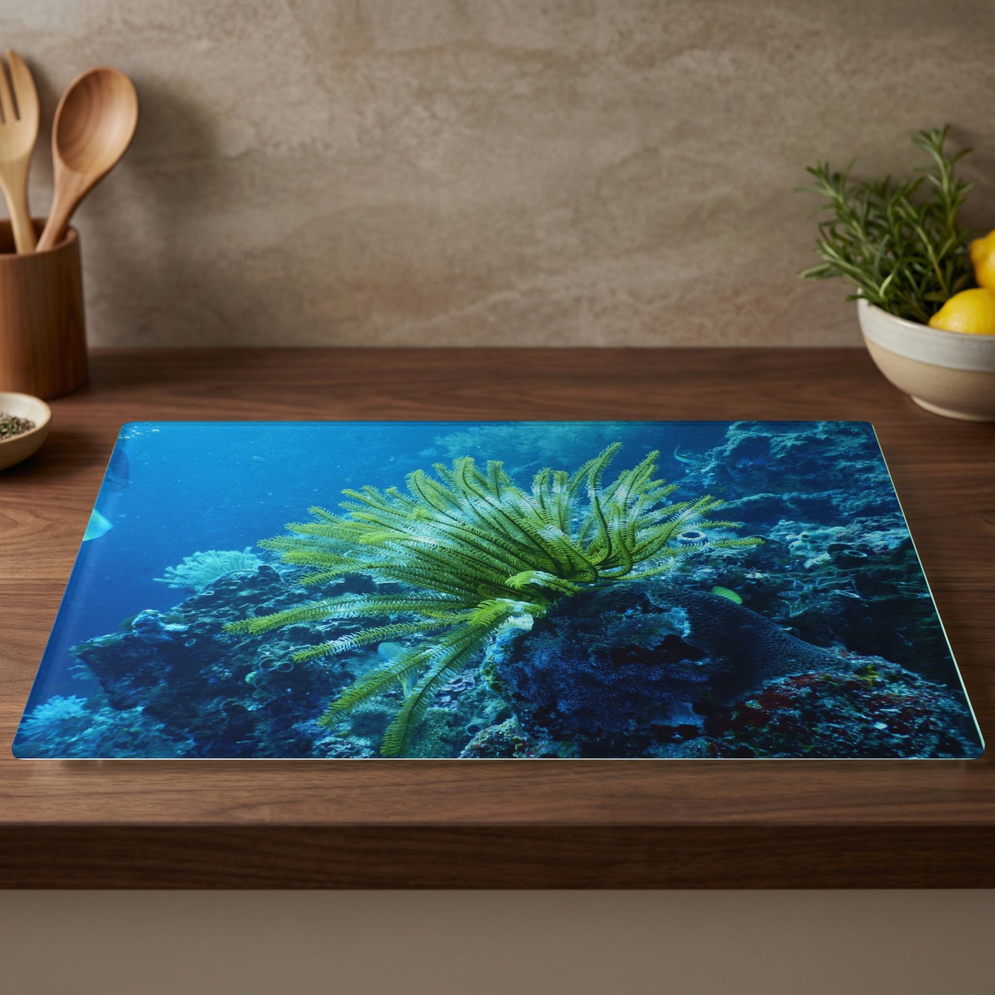 Glass cutting board with a vibrant underwater coral reef and sea lily.