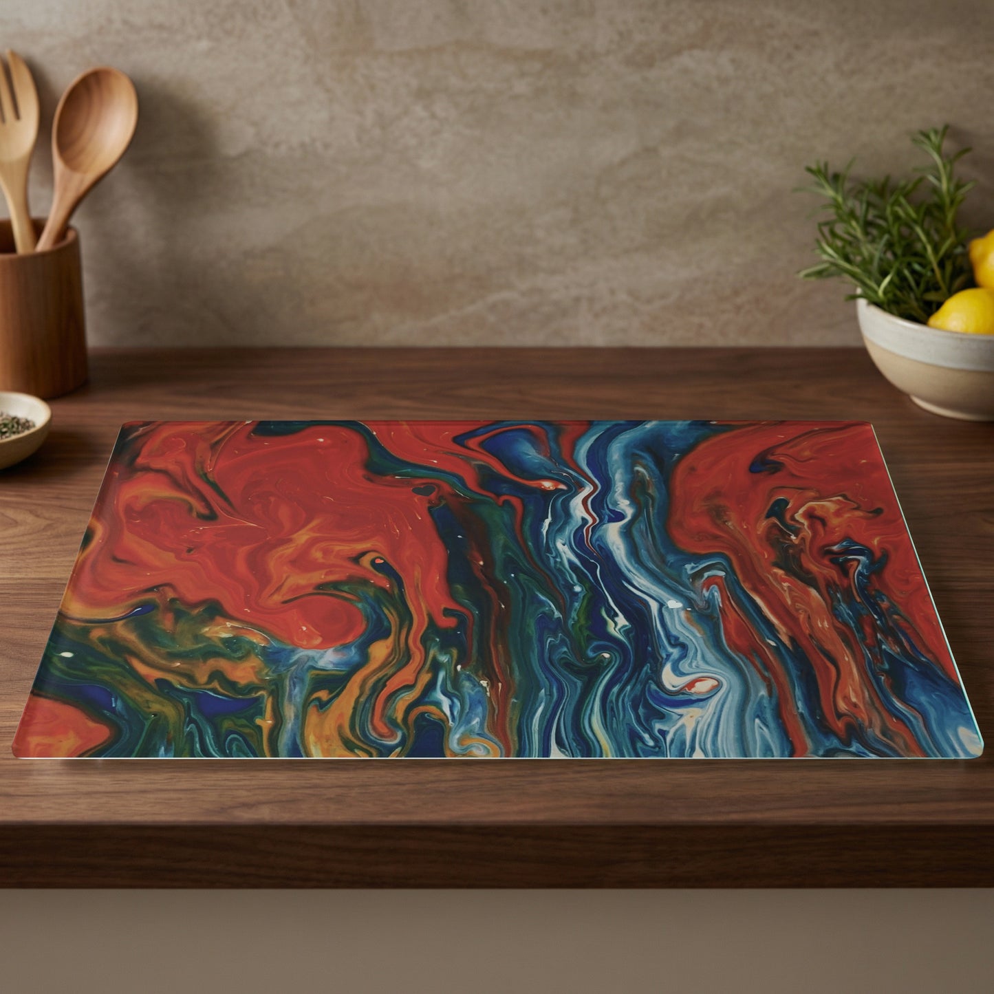 Tempered glass cutting board with vibrant blue, red, and gold abstract marbling.